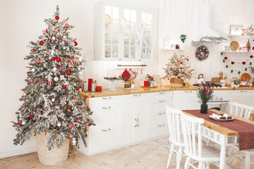 Christmas decoration on the kitchen. Kitchen interior holidays. New Year design.