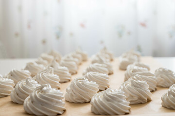 Homemade marshmallows on the kun table. Freshly prepared marshmallow.
