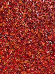 Red and orange shiny stone abstract texture pattern