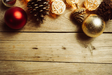 Christmas light and decorations on wooden table for background