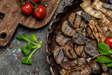 Sweet purple potatoes fries on a dark background. Food recipe background. Close up