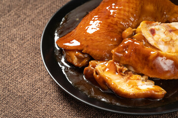 Braised Roasted Chicken Legs on Monochrome Background