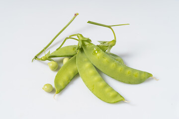 Fresh snow peas on monochrome background