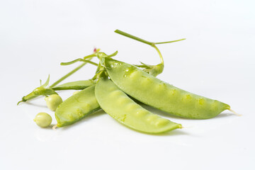 Fresh snow peas on monochrome background