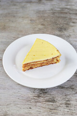 Jack fruit Sansrival cake slice served in a dish isolated on background top view of dessert
