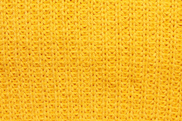 Fototapeta premium Close-up smooth abstract texture yellow color fabric cloth textile background, cotton knitted wool material. Macro, web theme, template, wallpaper, concept design, for your design, in detail