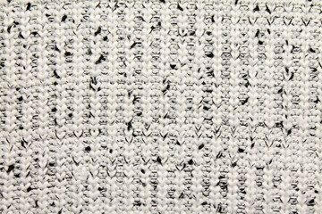Close-up smooth abstract texture white color dotted fabric cloth textile background, knitted wool material. Macro, web theme, template, wallpaper, concept design, for your design, in detail