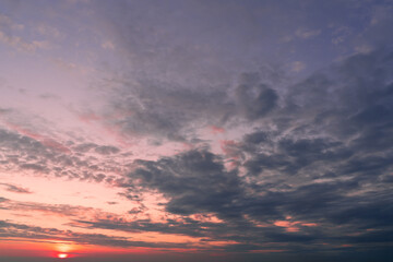 Twilight sky with effect of light pastel tone. Colorful clouds on the dramatic sunset sky