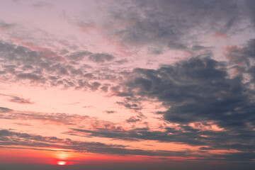 Twilight sky with effect of light pastel tone. Colorful clouds on the dramatic sunset sky