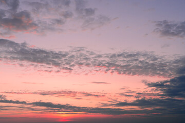 Twilight sky with effect of light pastel tone. Colorful clouds on the dramatic sunset sky