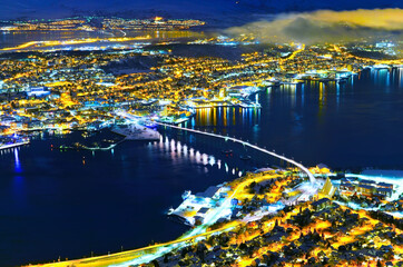 View of TView of Tromso, Norway at night in winter.romso, Norway at night in winter.