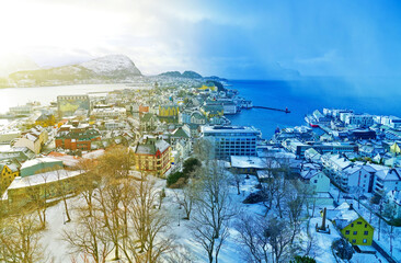 View of Alesund in Norway while rainstorm is approaching from the sea.