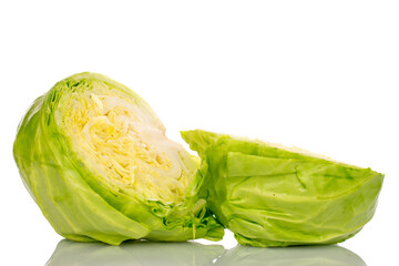 Fototapeta premium Two halves of fresh white cabbage, macro, isolated on white background.