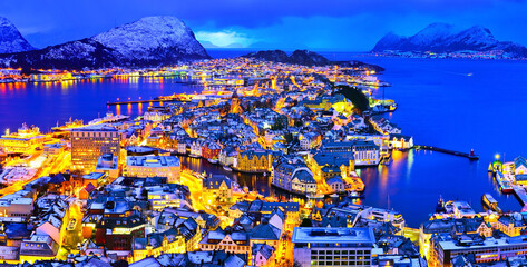 View of Alesund, Norway at night in winter.