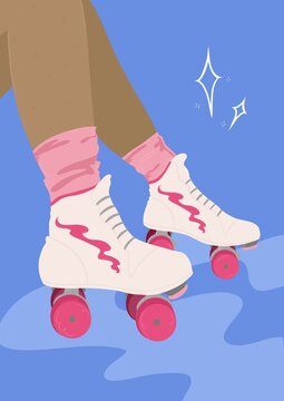 Close up women's pink and white rollerblades / rollerskates 