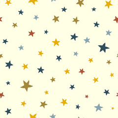 Fototapeta premium Repeating pattern of bright colored stars of different sizes on a light background.