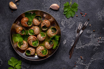 Bourgogne Escargot Snails with herb garlic oil. © tbralnina