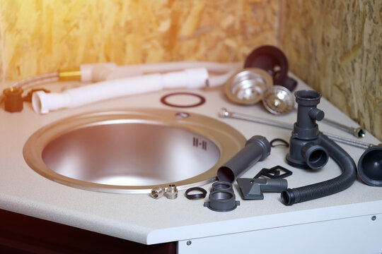 Tools And Water Tap Ready For Installation Sink On Countertop