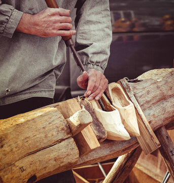 A Traditional Dutch Craft Of Making Wooden Traditional Shoes. The Making Of Clogs