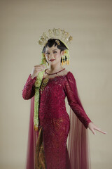 Beautiful model, wearing Javanese Indonesian wedding dress.