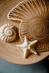 Spa concept. Soap and candles shells on a wooden background. Cozy home. Relax