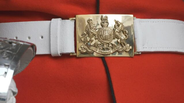 A close up view of a royal guard’s belt.
