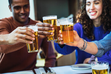 Cheerful team worker toast beer glasses celebrate project success achieving goal