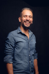 Obraz premium White man smiling, in studio, gray hair