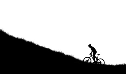 silhouette of a cyclist on the road