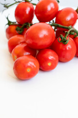 Cherry tomatoes. ripe red cherry tomatoes. lie on a white background