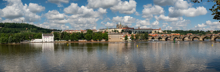 Fototapeta na wymiar At the gate of Charles Bridge Prague Castle and river Vltava Prague Czech Republic.