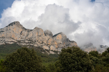 Fototapeta na wymiar magnificent view of cloud topped Spanish Pyrenees mountains