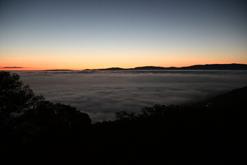 sunset over the clouds