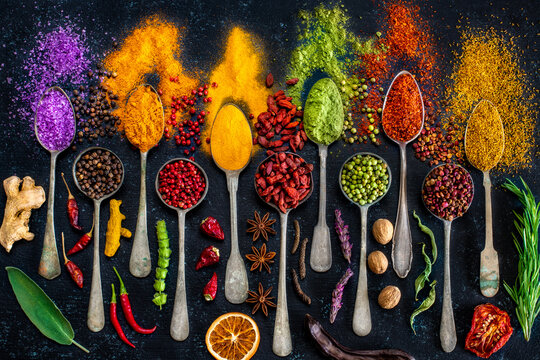 Various spices and dried fruits on the table.