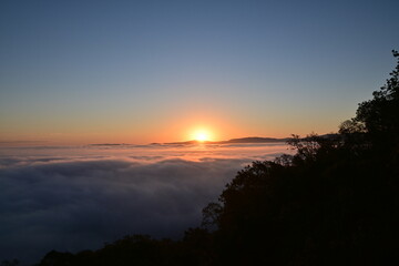 sunset over the clouds