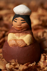 ceramic figure representing Virgin Mary with South American style. woman ceramic figure.