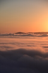 sunset over the clouds