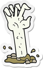 sticker of a cartoon zombie hand rising from ground
