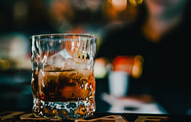 bartender making cocktail in bar
