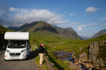 Tourists in motorhome in the Glencoe Dales in Scotland