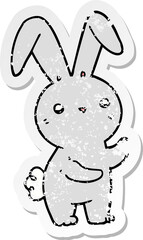 distressed sticker of a cute cartoon rabbit