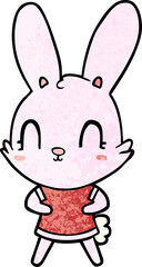 Obraz na płótnie Canvas cute cartoon rabbit in dress