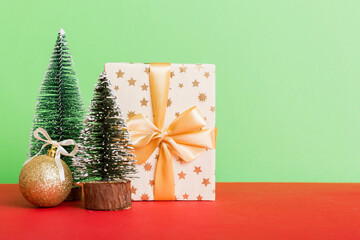 Christmas composition. craft Gift box, small tree, branches and craft DIY decorations on white background. New year concept. Christmas home decoration Flat lay, top view, copy space