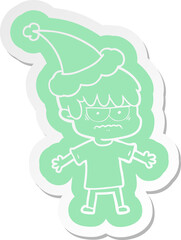 annoyed quirky cartoon  sticker of a boy wearing santa hat