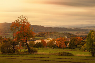 Hilly rural landscape in autumn season.