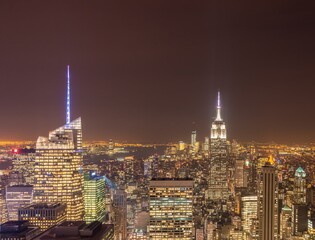 Naklejka premium Night view of New York Manhattan during sunset