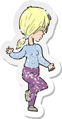 retro distressed sticker of a cartoon girl dancing