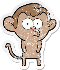 distressed sticker of a cartoon hooting monkey
