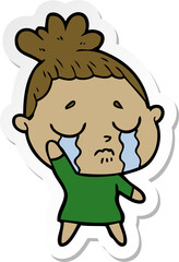 sticker of a cartoon crying woman