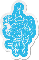 quirky cartoon distressed sticker of a panting dog wearing santa hat